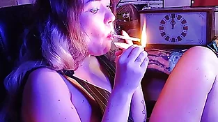 gorgeous stepsister smokes a ciggie